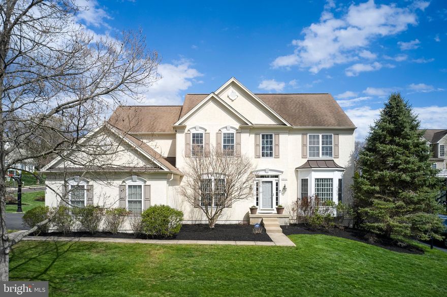 Nestled in the highly sought-after Bridge Valley at Furlong neighborhood, this stunning 5-bedroom, 4.1-bathroom home combines timeless elegance with modern updates and an unbeatable location within the award-winning Central Bucks School District. Step through the front door into the dramatic two-story foyer, where a grand staircase sets the tone for the home's graceful design. Gleaming hardwood floors lead you through the formal living and dining rooms, adorned with oversized windows, wainscoting, and crown moulding. Entertain with ease through the butler’s pantry, which connects seamlessly to the heart of the home—an expansive and beautifully updated kitchen. Featuring newer quartz countertops, a chic tile backsplash, upscale stainless-steel appliances, rich wood cabinetry, a spacious center island ​a​nd breakfast bar, ​a​ll with a walk-in pantry with custom organization, this kitchen is designed to be the center of every celebration. Enjoy meals in the ​adjacent Florida room​, the breakfast area, or step outside to the spectacular Trex deck, surrounded by mature landscaping for year-round privacy and comfort. The two-story great room is ​a showstopper, highlighted by a classic fireplace framed with elegant wainscoting—perfect for holiday gatherings or cozy nights in. A private office, convenient laundry room, powder room, and a generous three-car garage with ample storage complete the first floor. Upstairs, the luxurious primary suite features a tray ceiling and a spa-like en suite bathroom with dual vanities, upgraded quartz counters, a soaking tub, stall shower, private water closet, and a custom walk-in closet. A spacious princess suite offers its own private bath, while two additional bedrooms share a Jack & Jill bathroom. The finished walk-out lower level provides flexible space for recreation, fitness, gaming, or hobbies—plus a separate room with closet​ for whatever suits your needs, and the home's fourth full bathroom. A mechanical room offers additional storage, and a whimsical under-stair playhouse adds a fun surpris​e. Enjoy a prime location just minutes from the shops and ​r​estaurants of Doylestown Borough, with easy access to major commuter routes and walking distance to Bridge Valley Elementary. D​on't miss this long-awaited opportunity—schedule your private tour today and make 2800 Mountain Laurel Drive your forever home.