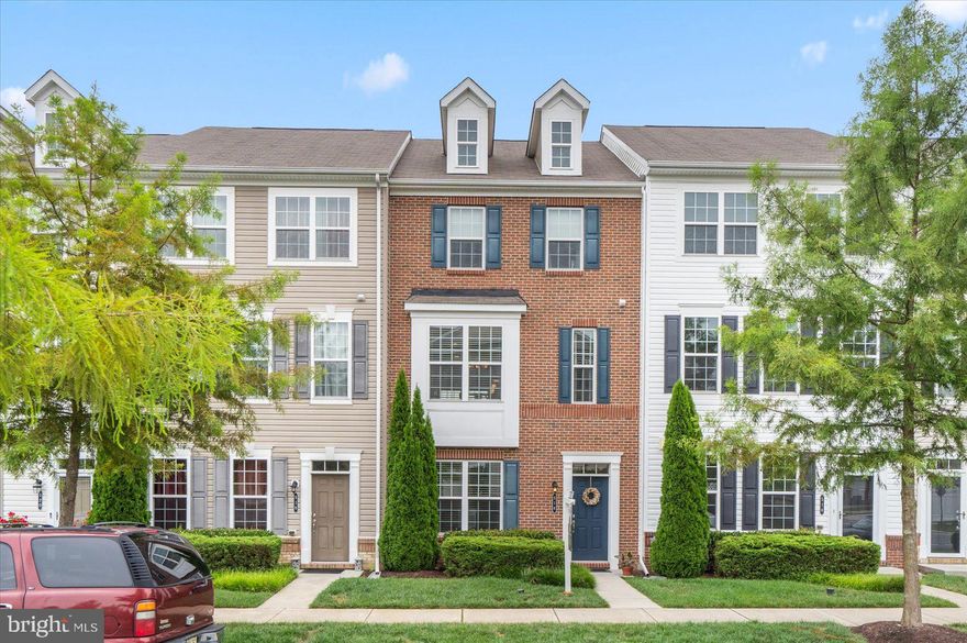 Welcome to your dream townhome in The Towns at Quarry Place!  Rarely available, this stunning 3 bedroom, 4 bathroom brick front townhome offers the perfect combination of luxury and convenience with captivating lake views and lush tree backdrops that ensure privacy and tranquility.

As you enter this splendid home, you are welcomed by an inviting foyer that leads to a versatile office space that can easily be transformed into a fourth bedroom, should your needs require it. Also on this level is a convenient half bathroom, additional storage, and access to the garage.

Ascending to the main living area, the bright and airy open-concept design welcomes you home. The family room merges seamlessly with the modern eat-in kitchen. Prepare gourmet meals or casual dinners at the large kitchen island, set against a backdrop of granite countertops, stainless steel appliances, and an ever-useful wet bar. The kitchen also features a spacious pantry and generous cabinet space, while a convenient half bath lies just around the corner.

Venture up to the third floor where tranquility meets style in the primary bedroom, featuring a tray ceiling and an ensuite bathroom showcasing sophisticated tile work and sleek glass shower doors. Two additional bedrooms offer comfort and flexibility, serving perfectly as guest rooms or additional office spaces. Completing this level is an additional full bathroom and the conveniently located laundry area, adding to the practicality of this home.

The outdoor living space is not to be overlooked. Enjoy the serene views of the glistening lake from your front yard or relax on the Trex deck with additional lake views. The inclusion of green spaces, jogging trails, pavilions, and a dog park within the community fosters a vibrant and active lifestyle.

Adding to the home’s appeal, the two-car garage includes an Electric Vehicle charger and versatile space for parking or extra storage. Enhanced by a Ring security system, this home not only offers beauty and functionality but also peace of mind.

Beyond the comfort of your home, the community is conveniently located near essential commuter routes. A short drive brings you to an array of shopping, dining, and entertainment options, ensuring you never have to compromise on convenience.

Seize the opportunity to own this beautiful townhome with breathtaking lake views and encompassing convenience in the heart of Reisterstown. Schedule your showing today!