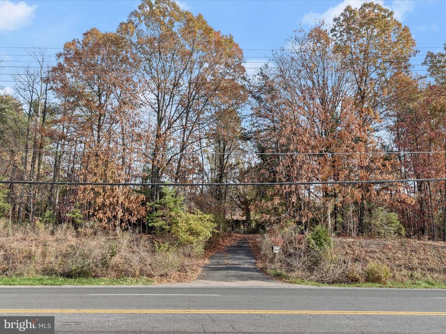 This expansive wooded property with over 29-acres presents a remarkable investment opportunity for developers and builders. It includes a 17.98-acre parcel (Tax Map 0013, Parcel 35) plus an additional 34 recorded lots designated for single-family detached homes. The Oaklodge Farm Acres subdivision comprises Lots 1-29 (Tax Map 0013/Block A) and Lots 1-5 (Tax Map 0013/Block B), all zoned RSF95 with a minimum lot size of 9,500 sq. ft. (0.218 acres) totalling 8.13 acres. Additionally, there is a 3.18 acre easement for public use, altogether the combined land is over 29 acres. The subdivision is accessed from Ammendale Road and benefits from existing county water and sewer lines along Old Baltimore Pike and Ammendale Road. It is located across from Vansville Elementary School and the Vansville Recreation Center and Park. The property offers significant potential, whether for development using the recorded subdivision lots or exploring alternative uses by combining all parcels. The 17.98-acre parcel also features an old, deteriorated building that once served as a hotel lodge, along with a few smaller shed structures. This property’s prime location offers outstanding convenience, situated just off Rt. 1/Baltimore Avenue with quick access to major highways including Rt. 200, I-95, I-495, and the Baltimore-Washington Parkway. The Muirkirk MARC train station is only minutes away, providing additional commuting options. A variety of nearby shopping, dining, and entertainment options enhance the appeal of this highly desirable area. Do not enter the deteriorated structure on property.  All Buyers and Buyer's Agents must sign a Hold Harmless before accessing the property.