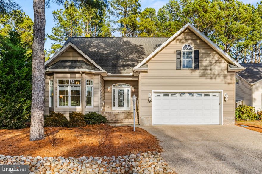 Welcome to 240 Teal Circle, Ocean Pines! A beautiful custom-built two-story home that has been meticulously maintained—pride of ownership at its finest. This thoughtfully designed residence offers 3 bedrooms and 3 full bathrooms, plus a versatile flex room currently used as a 4th bedroom, making it ideal for guests or a home office. This property features two primary bedrooms that are conveniently located on the main level, offering walk-in closets and spa-like bathrooms with one featuring a double vanity and a walk-in tiled shower with double glass panel doors. Step through double doors of the one primary to your private sitting area with partial water views, an ideal spot to relax and unwind. The open floor plan is filled with natural light and features vaulted ceilings, recessed lighting, and a cozy gas fireplace, creating a warm and inviting atmosphere. The custom kitchen is a standout with granite countertops, tile backsplash, gas cooktop, wall oven, and ample cabinetry, perfect for everyday living and entertaining. Additional features include laundry on the main level, surround sound, central vacuum, Trex decking, and an outdoor shower, enhancing both comfort and coastal living. Enjoy what all Ocean Pines has to offer;  an impressive array of amenities including marinas, scenic walking and biking trails, yacht club, beach club, pools, golf, and more. This home truly offers the perfect blend of custom craftsmanship, modern convenience, and resort-style living. Schedule your private showing today and experience all this home and community have to offer!