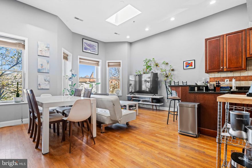 Welcome to The Natalie—a sophisticated urban retreat where timeless elegance meets modern convenience. This exquisite 2-bedroom, 2-bathroom UNFURNISHED residence is a sanctuary of style and comfort, offering a private deck terrace and exclusive OFF STREET PARKING for unparalleled convenience. Natural light pours into every corner, highlighting the charming exposed brick accent walls and the rich hardwood floors that flow seamlessly throughout the home. The thoughtfully designed chef’s kitchen is a culinary dream, complete with sleek stainless steel appliances, a sunlit breakfast nook, and luxurious finishes that inspire creativity. A cozy fireplace brings warmth and character to the living space, while dramatic skylights add a touch of sophistication and bathe the interior in sunlight. Step outside to your spacious private deck terrace, a serene escape perfect for hosting al fresco dinners, enjoying stunning sunsets, or unwinding under the stars. With plenty of room for grilling and entertaining, this outdoor oasis is truly unmatched. Private parking in the rear alley adds a layer of convenience to this stylish home, seamlessly blending practicality with charm. Combining modern comfort with timeless elegance, this home is a rare gem in a prime location within 11 mins walk to both U Street and Columbia Heights metro and all the bars and restaurants, U Street, 14th and Columbia Heights has to offer. PETS ARE CASE BY CASE BASIS, ALL TENANTS WILL BE PROFESSIONALLY REFERENCED AND CREDIT CHECKED WITH SCORES OVER 720. PROPERTY IS UNFURNISHED AND AVAILABLE IMMEDIATELY.