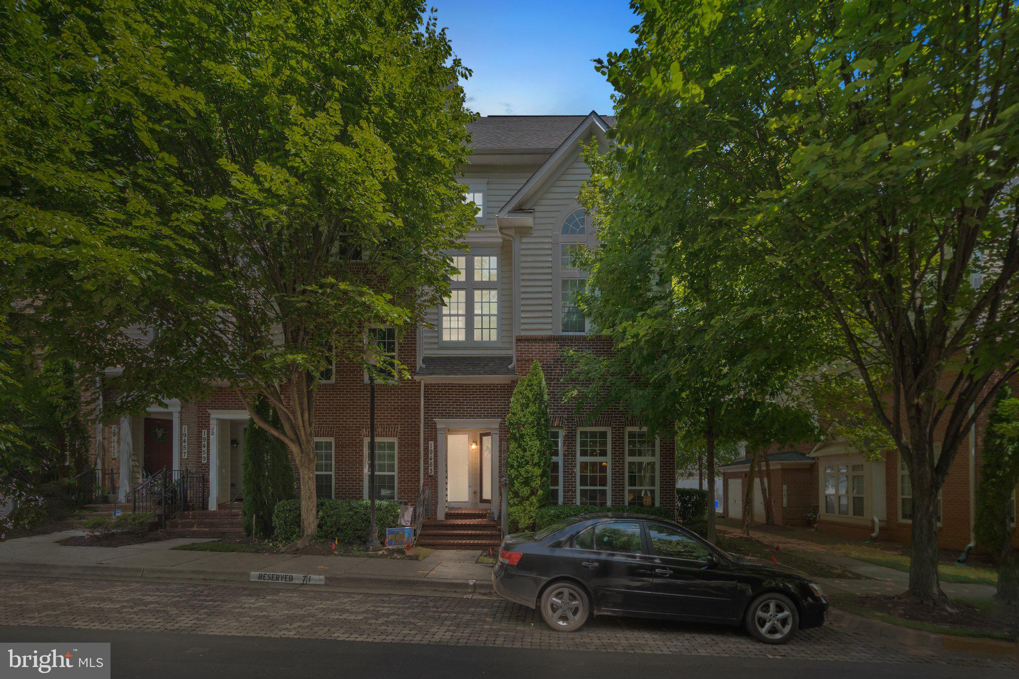 Seize the opportunity! Brick 2 level Condo townhouse in popular Buckingham Station community. Walk-in and you'll instantly notice the high-ceilings with crown molding, the bright & open living, dining and kitchen combo area complete with New wood-like laminate flooring, tons of natural light. Kitchen features breakfast bar, pantry storage, lots of granite countertop space, stainless steel appliances, gas cooking, undermount microwave, beautiful and bright maple cabinets. Neutral tone powder room with pedestal sink. Head up to the second level featuring a large primary bedroom, with a perfect en-suite offering two separate vanities, soaking tub, large walk-in closet and your personal Balcony off of the primary bedroom. Second bedroom with another full bathroom PLUS laundry on the bedroom level...no more lugging the laundry between levels. 1-Car attached garage plus drive-way parking space. Fresh paint throughout, new carpet, new appliances (2022) and more. This home is located in a very convenient location close to all things shopping, dining, parks, Black Rock Center for the Arts and MORE! Quick access to Marc Station & I-270. Move-in ready for you to put your personal touch and make this house your home!
