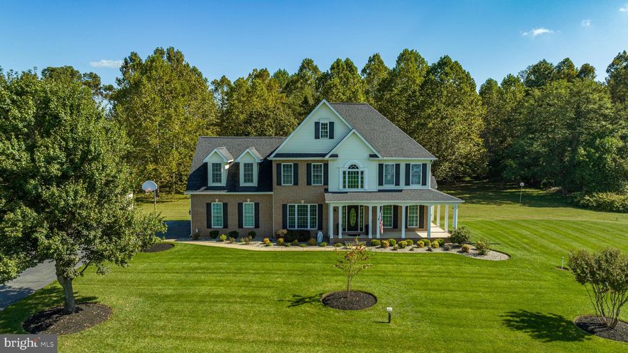 Introducing 5270 Celestial Lane—a blend of modern luxury and pastoral charm located in the heart of Waldorf, MD. Situated on 3 acres of idyllic land, this newly remodeled and meticulously maintained brick-front home offers an array of premium features, all without the confines of an HOA.

**Exterior and Landscaping:**  
Welcoming you home is a stunning wraparound porch, an ideal spot for your morning coffee or late-afternoon relaxation. Enjoy the new 12’ x 16’ composite deck while overlooking the expansive backyard and envision a future pool under the sky—there's more than enough room. Nature meets nurture with river stone gardens and a state-of-the-art lawn irrigation system, keeping your curb appeal at an all-time high without adding to your water bill.

**Main Level:**  
Step inside to a grand two-story foyer adorned with hardwood floors that flow seamlessly through the main level. Enjoy a dedicated office space enclosed by elegant French doors, a separate dining room for special occasions, and a handy powder room. The main level also features a separate laundry room with LVP flooring conveniently located off the kitchen.

**Kitchen:**  
For culinary enthusiasts, the newly renovated open-concept kitchen is a dream come true. White cabinets with under-cabinet lighting, quartz countertops, and stainless steel appliances set the stage for your next gourmet creation. The spacious dining area accommodates a table for eight with ease and flows into a light-filled family room—perfect for cozy gatherings by the gas fireplace.

**Upstairs:**  
Retreat to your primary bedroom featuring a newly renovated en-suite complete with a subway-tiled shower with bench seat, double vanity with custom quartz countertop, freestanding tub, LVP flooring, and two generous walk-in closets with custom shelving. The upper level also houses three additional bedrooms, two linen closets, and a newly renovated hall bathroom with subway tile and adorned with stylish navy and matte gold accents and new LVP flooring.

**Basement Apartment:**  
Whether you require extra living space or aim to generate additional income, a full daylight basement apartment has you covered. Complete with a full kitchen and breakfast bar, laundry, dining and living areas—plus a cozy propane fireplace—it's essentially a second home under your roof.

**Added Amenities:**  
- Water Softener  
- New Roof and HVAC system  
- New 12’ x 16’ composite deck
- Custom Brick Mailbox  
- In-ground 10ft basketball hoop  
- Stone Fire Pit  
- 12' x 18' Amish-built shed for all your storage needs  

All rooms have been freshly painted, and new carpeting graces the bedrooms. Sellers giving 1-year home warranty. This home doesn't just tick all the boxes—it draws new ones and ticks those too! Book your viewing today.