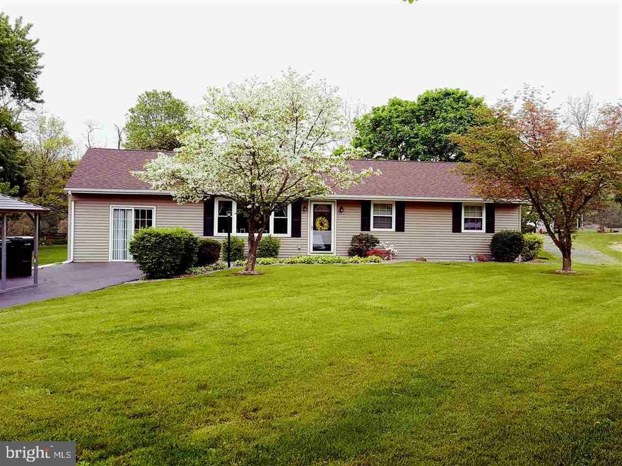 Don't miss this beautiful 3 bedroom 1 bath ranch next to Kings Gap!!  Adorable country kitchen, 2 family rooms, new laminate hardwood, a screened rear porch overlooking the above ground pool, and for the mechanic,  a huge detached garage with large overhead door.  All of this on .7 acres.