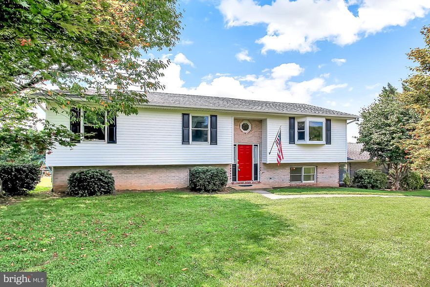 You could be in your new home before the new school year starts! Welcome home to this spacious 3 BR, 3 BA home, on a gorgeous 1.47 acre lot!   This home sits in a small community conveniently located to I-95, Routes 1 and 40, for an easy commute in any direction.   The highlight of the main level is the open kitchen/dining/living room area with vaulted ceiling and new front bay window.  Step out of the kitchen onto the rear deck and enjoy the panoramic vistas while the family plays in the expansive back yard.  Master bedroom offers walk-in closet and full bath with spa tub and walk-in shower.  Lower level offers a HUGE family room with cozy coal stove for winter nights, another full bath and a massive unfinished storage and workshop area.  There is plenty of room for your vehicles and toys in the attached 2-car garage and detached 1-car shed.  Other amenities include central vacuum system, Electrolux washer and dryer, newer HVAC system, new dishwasher, many new windows and doors and more!  All this and a one-year home warranty make this a great value!