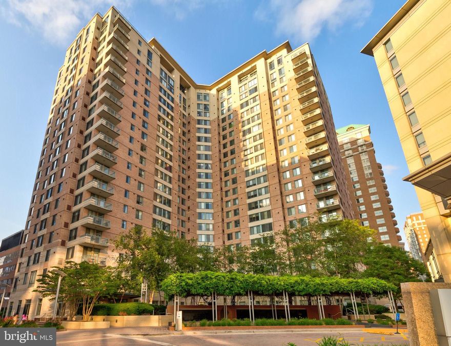 Live in the center of the thriving Ballston area in The Continental. This spacious, two en-suite, condo apartment exemplifies modern, amenity-rich living in a desirable neighborhood on the corridor of Arlington. This home features an open-concept kitchen and living space with dark, granite countertops and stainless steel appliances, accented by a tasteful backsplash. Hardwood floors provide a classic feel, leading to full-length plantation shutters over large windows. A street view of Ballston in the foreground and a treed, hill view in the background can be seen from all windowed spaces. With walk-in closets and generous, updated bathroom spaces, there's no corner cut on comfort in the home. The Continental features abundant amenities, including a fitness room with weights and workout equipment, a business center, tiered movie theater, meeting and event spaces, a pool, and a rooftop deck with panoramic views of DC and Northern Virginia. One garage parking space comes with this home. This fantastic home will not last. Home is available in early June!