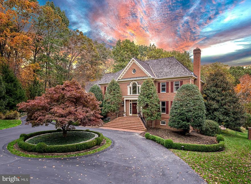 Exquisite custom home on a premium 5 acre lot backing to Difficult run. Luxurious interior with 5 bedrooms, 4.5 baths and a circular driveway leading to a 3 car garage. An entertainer s dream with a chef's kitchen, breakfast room, dining room, living room and family room. Luxurious owners suite with a sitting room, dual walk-in closets and spa-like bath. Finished walk out basement with recreation room, game room, in-law suite and media room. Backyard retreat perfect for outdoor living with a heated pool, waterfall features, expansive hardscaping, screened-in porch, deck, hot tub and lighted sports court. If you want a private retreat, minutes from everything, this is the home for you!