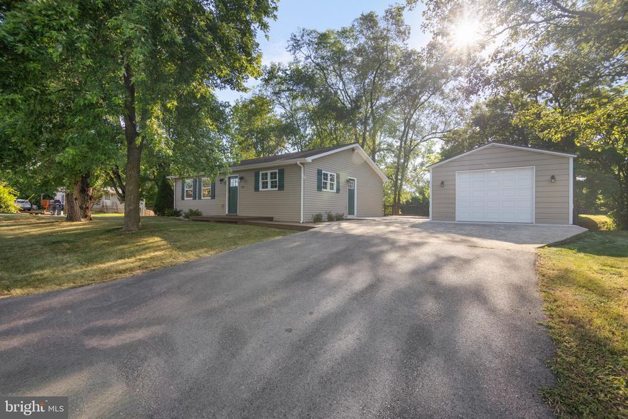 This recently upgraded home on the outskirts of downtown Martinsburg offers both convenience and privacy. Situated on a spacious, private lot, it features a large garage for extra storage and parking. Outside, there's a newly constructed large deck ideal for outdoor relaxation and entertaining. Inside, you're welcomed by a spacious kitchen dining room combo with brand new appliances. The entire house boasts new LVP flooring and carpeting. Adjacent to the kitchen is a sizable living room, perfect for gatherings. Towards the back of the house are two bedrooms, each equipped with large closets. The centrally located bathroom includes a shower tub combo and houses a laundry closet for added convenience. This home combines practicality with modern upgrades, offering a comfortable and private living space. Schedule your showing today!