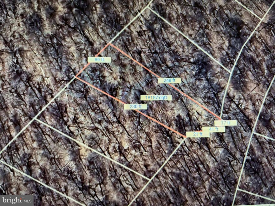 Beautiful mountain land located just off Moreland Gap Road on Rattlesnake Lane .  Currently zoned residential.  .44  acre lot is wooded. Wooded lot and  4 wheel drive may be required.