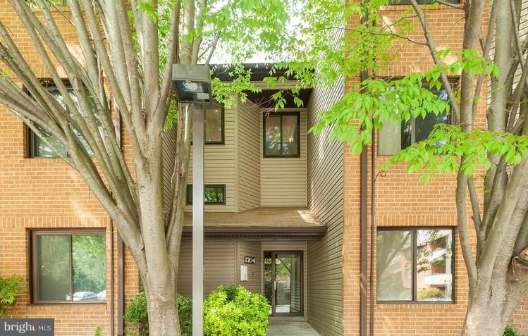 Beautiful woodsy setting! Two bedroom, two full bath condo with balcony and fireplace (with new lining)- also conveys with underground garage parking space and storage unit close to elevator for easy living. Freshly painted, and professionally cleaned with new floors in kitchen. Reading area in communal garden space. Building is in great shape with no assessments on the horizon.