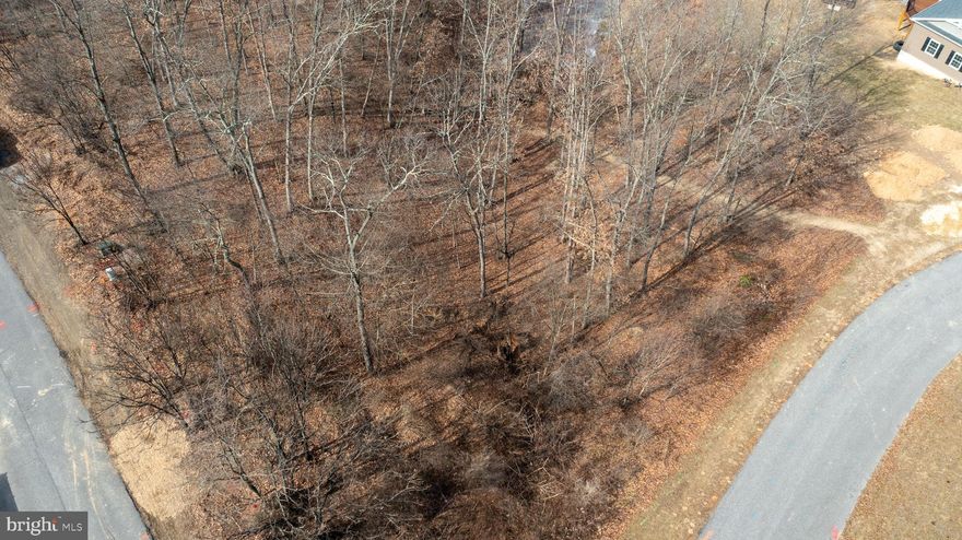 Looking to build your dream home in Wild and Wonderful West Virginia? Check out Lot 27 in Ashby Crest Estates. This 0.65 acre corner lot has public water and sewer hookups as well as electric on site! This property is conveniently located within 15 minutes to Frankfort schools, Northrop Grumman and IBM. For more info or directions to the property, call today!