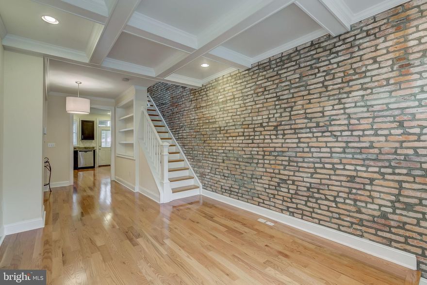 A VERY LOVELY MUST HAVE HOME AWAITS YOU ON PRIME CANTON BLOCK.   HOME WAS RECENTLY RENOVATED FROM TOP TO BOTTOM.   AMPLE SIZED BEDROOMS WITH GOOD CLOSET SPACE.  LOWER LEVEL BEDROOM SUITE HAS EGRESS AND FULL BATH- PERFECT FOR ROOMMATE SCENARIO.  GORGEOUS KITCHEN OFFERS STUNNING COUNTERS AND CABINETS WITH GLISTENING FLOORS.  SEPARATE DINING SPACE FLOWS RIGHT IN TO AMPLE SIZED LIVING AREA.  EASY TURN IN PRIVATE PARKING PAD MAKES CITY LIFE CONVENIENT FOR YOU!  ENJOY THE BEST OF THE CITY VIEWS FROM YOUR ROOF TOP DECK!  COME SEE THIS ONE QUICK!