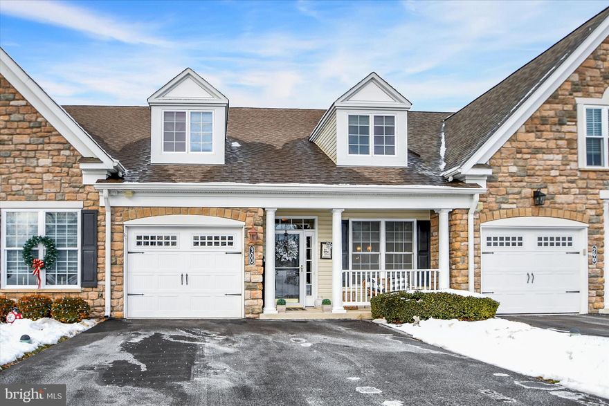 Pop the Champagne cork, Cue the Fireworks and Ring in the New Year in Style! This lovely Village at Rosecliff townhome offers more than $50,000 in upgrades and extras and has been meticulously maintained! A welcoming  front porch greets you and your guests. Stepping into the hardwood clad first floor you are enveloped by a sense of warmth from the wainscot wrapped foyer through the eat in kitchen featuring 42" maple cabinets, Corian countertops, double sinks, tumble marble backsplash, gas stove, indirect lighting and custom blinds.
The dining area features a three-sided fireplace and chair rail along with the warm gunstock color of the true hardwood floors, the tray ceiling with crown moulding gives the space a little something special. The main living room flows seamlessly from here and features a two-story vaulted ceiling, skylights and ceiling fan.
Travertine tile floor and barrel-vaulted ceiling highlight the sunroom addition adding bonus square footage living space to the main floor and leads out to the paver patio and tree lined backyard.
The Main Suite is conveniently located off the formal living room and again features real hardwood floors, tray ceiling with crown moulding, chandelier and large walk-in closet.  Main bath has travertine tile, updated double vanity, fiberglass shower stall and comfort height commode.
The updated powder room and laundry with extra cabinetry complete this floor.
The second floor features a large loft family room with indirect lighting and neutral carpet, a custom designed home office with built in cabinetry and guest bedroom with dormered windows. The second-floor full bath with tub/shower combo complete this floor. Added features include: 2 zoned heat, convenient shopping nearby. *Note that interior square footage number may not reflect sunroom addition.