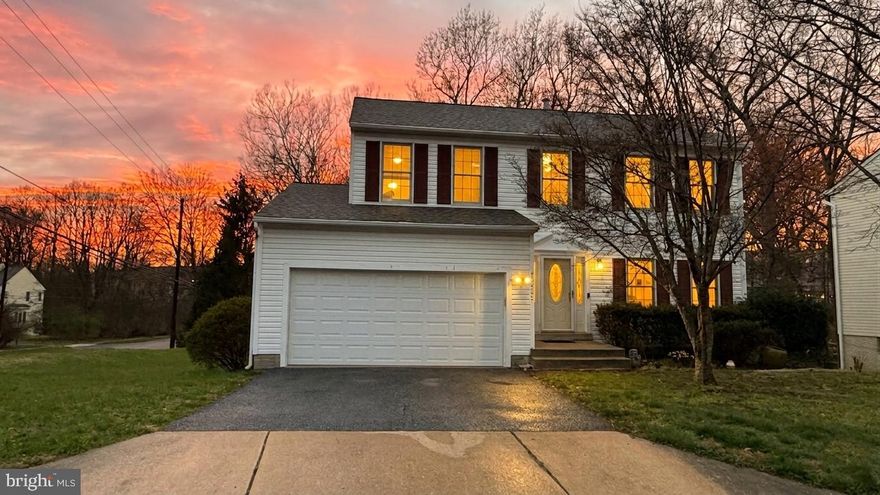 Welcome to this striking colonial, perfectly positioned on a coveted corner lot in Gaithersburg’s premier Meadowvale neighborhood. With over 3,000 square feet of meticulously maintained living space across three finished levels, this residence balances traditional charm with high-end, functional upgrades.

The experience begins in the two-story foyer, a bright introduction to the home’s open and airy floor plan. Throughout the home, newly installed dimmable recessed lighting allows you to tailor the ambiance of every room. The expansive family room serves as the home's anchor, featuring rich hardwood floors and a wood-burning fireplace—an ideal setting for quiet weeknights or lively weekend gatherings.

At the heart of the home is the fully renovated kitchen, designed for both the home cook and the frequent host. Features include:
• A large granite island that comfortably seats three, featuring integrated drawers for spices and utensils.
• Built-in power and USB ports located at the island, designed for both powering kitchen appliances and keeping your devices charged.
•  A sleek gas range and premium stainless steel appliances.
• Custom cabinetry and a large shelved pantry closet.
• A sun-drenched eat-in area that flows naturally to the outdoors for a seamless cooking and serving experience.

Transition to the new upper-level Trex deck, engineered for beauty and long-term durability. This premium composite material ensures years of enjoyment with minimal maintenance, providing the perfect platform to capture unobstructed sunset views. Below, the massive backyard offers a sense of quiet seclusion rarely found in the area. Backing to mature trees and secured by a brand-new fence, this private lawn provides a scenic backdrop for relaxation, complete with a dedicated storage shed.

The upper level is headlined by the primary suite, where cathedral ceilings and customizable recessed lighting lend a sense of volume and grace. The en-suite bathroom serves as a personal spa, featuring a jetted soaking tub, dual vanities, and premium finishes. Three additional generously sized bedrooms—each equipped with new lighting—provide the versatility needed for family, guests, or a dedicated home office.
The finished walkout lower level further expands the footprint, offering a large open recreation area, a private fifth bedroom, and a full third bath—ideal for guests or an au pair suite.

Every major detail has been addressed for a seamless move-in:
• Systems: Brand-new A/C system and high-efficiency LG large-capacity laundry.
• Lighting: New dimmable recessed lighting installed in every room.
• Finishes: New carpeting, custom window treatments, and fresh paint.
• Structure: New Trex deck, new fencing, and a spacious two-car garage.

Located in one of Gaithersburg’s most accessible pockets, you are just 1.5 miles from the RIO Washingtonian Center, Flower Hill Shopping, and the Montgomery County Fairgrounds. Commuting is effortless with immediate access to I-270, ICC/MD-200, and the MARC train, while local aquatic centers and greenways keep recreation right at your doorstep.

This isn't just a house; it’s a thoughtfully upgraded home designed for those who value both community and a private place to recharge.

Property is equipped with video surveillance.  Audio recording devices are disabled during showings and open houses.