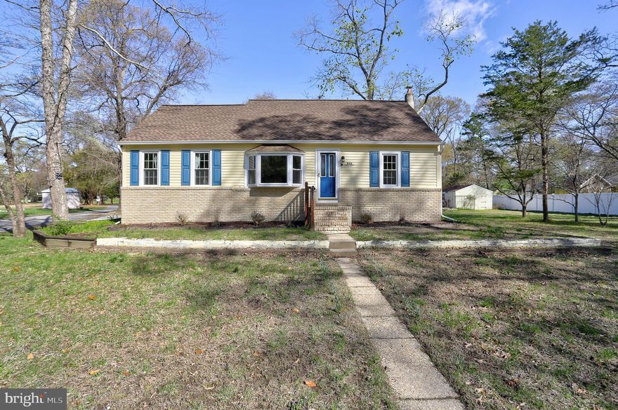 This meticulously maintained Cape Cod home sits on a .99-acre lot in a water-privileged community in Lake Shore, offering the perfect blend of convenience and tranquility. The remodeled kitchen boasts beautiful granite counters, stainless steel appliances, and Brazilian cherry wood floors, making it a true culinary haven. There’s ample parking for a boat, camper, and multiple cars, which is a huge bonus. The formal living room is accentuated by elegant colonial molding, and the first-floor primary suite is a peaceful retreat with a walk-in closet. The remodeled master bath features ceramic tile and is both stylish and functional. Step out onto the deck and enjoy serene views of nature—deer, foxes, birds, and rabbits are frequent visitors. Location-wise, the home is close to everything yet far enough removed to offer a peaceful escape from the hectic city life. If you’re a fan of nature, this is the place for you. You’ll have plenty of land to pursue gardening or other projects. Plus, you’re close to parks where you can walk, swim, play, and fish. The local businesses offer plenty of opportunities to support the community. The home has been updated with several major improvements: the basement was waterproofed with a drain and sump pump (2021),  the HVAC system was updated (2019), including the oil tank (2022), and the roof (2020), vinyl siding & shutters (2022),  new bay window  & basement windows (2022, all other windows replaced, (2011), new water heater (2020), vinyl fence (2022),  updated kitchen and baths (2005). This home truly combines modern updates with a natural, tranquil setting—an ideal retreat for those who enjoy both comfort and nature.