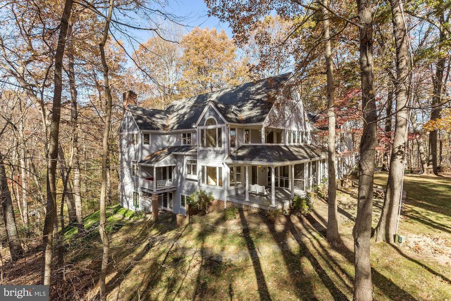 Chateau in the woods! Private drive to secluded oasis on over 4.5 treed acres incl spring-fed creek and pond with large koi, turtles and abundant wildlife. Upgraded custom home incl gourm kit w/stainless & granite. Master suite w/luxurious bath, walk-in closet & balcony for relaxing. Huge home office w/separate entrance, LL in-law suite w/kitchenette & screened porch. Your own personal retreat!