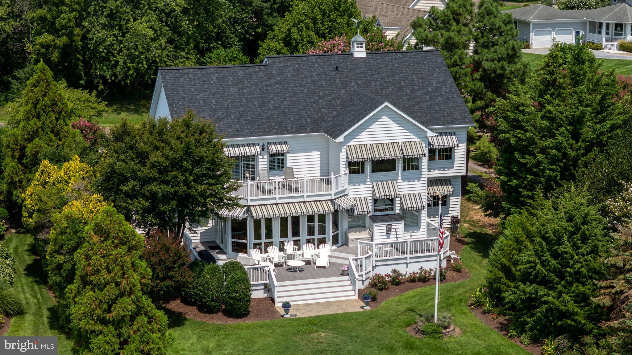 Welcome to waterfront living at its finest on picturesque Tilghman Island! This beautifully maintained 3,040 sq ft Colonial offers stunning open water views and a lifestyle of comfort, elegance, and ease. Boasting four spacious bedrooms and two and a half baths, this home features a flowing floor plan with natural light, generous living spaces, and a perfect blend of indoor and outdoor living.
Enjoy your morning coffee while watching boats drift by, or relax in the evening with views that will take your breath away. The home is located in a sought-after waterfront community offering fantastic amenities including a clubhouse, pool, and marina—perfect for boating, entertaining, and leisure. Whether you’re looking for a peaceful full-time residence or a weekend retreat, this home checks all the boxes. Just bring your boat and your dreams! NEW ROOF & FIREPLACE 2024, NEW APPLIANCES 2019