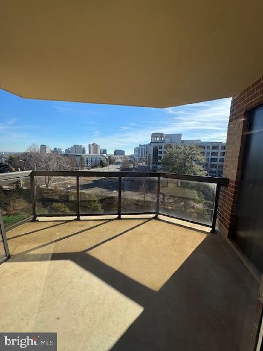 Unit 618 is a spacious one-bedroom, one-bath residence located on the 6th floor of The Rotonda, ideally positioned on one of the building’s most desirable sides with open views facing Tysons Galleria. This fully renovated home offers generous ceiling height, with popcorn ceilings removed to create a clean, modern aesthetic throughout. Morning sunlight fills the unit, making breakfast and everyday living especially enjoyable from this bright, high-floor vantage point.

The thoughtfully renovated kitchen features expansive countertop space, abundant cabinetry, and a large pantry. Ideal for both everyday use and entertaining. A truly rare and highly sought-after feature, the unit includes a private, separate laundry room, the only one of its kind in the building.

The inviting primary bedroom is complemented by an oversized walk-in closet, plus an additional closet and a linen closet conveniently located just outside the bedroom. The layout balances comfort and convenience, with close proximity to all elevators. Major systems have been well maintained, including a Carrier HVAC system replaced during renovation. The home also conveys a dedicated, secured storage unit in the garage.

The Rotonda offers ample parking with two unassigned surface parking spaces per unit and approximately 1,600 unassigned spaces available for residents and guests throughout the community. Building 2 provides the added convenience of parking located both in the front and rear of the building.

Set on 34 gated acres in the heart of Tysons, The Rotonda delivers an exceptional, amenity-rich lifestyle. Residents enjoy a newly renovated community center featuring indoor and outdoor pools, a brand-new fitness center, yoga studio, lounge, office and meeting spaces, and extensive recreational amenities. The location is walkable to premier shopping and dining, the Silver Line Metro, Whole Foods, and offers easy access to I-66, I-495, and downtown Washington, DC.

This turnkey condo must be seen to fully appreciate its space, light, and lifestyle. Welcome home! Don’t miss this incredible opportunity to live in one of Fairfax County’s most sought-after gated communities with unbeatable amenities, location, and school district.