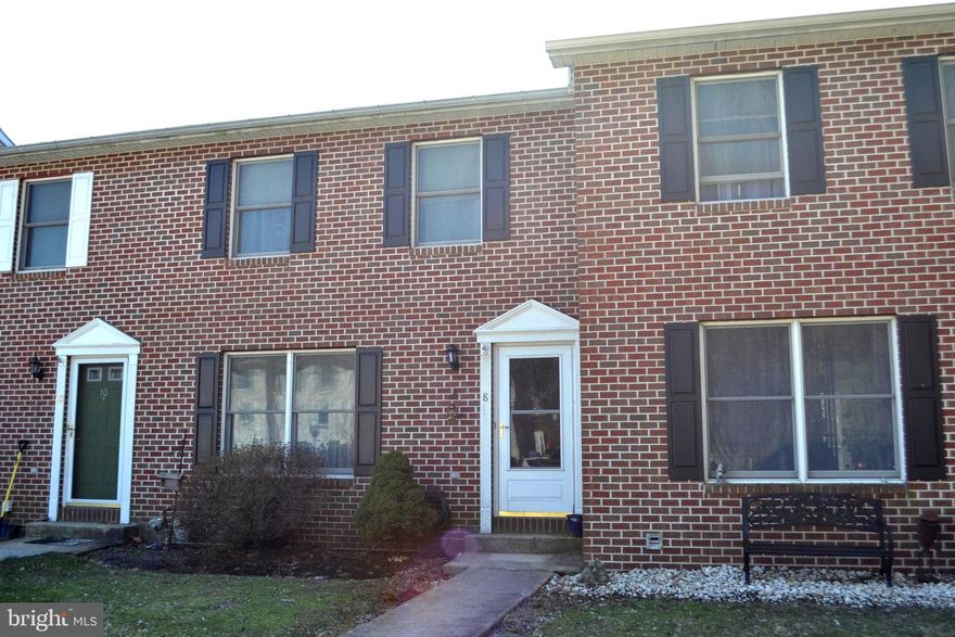 A townhome with no association fees & no rules & regulations.  This 3 bedroom, 1.5 bath home has it all. A spacious open kitchen/dining area, oak cabinets, plenty of counter space, & patio doors to your back yard deck.  A large living room with hard wood floors,& a half bath on the main floor. Upstairs are 3 bedrooms, the master is plenty large enough for a king size bed, & a full bath with a tub shower combo.  Lower level is the newly expanded laundry room, & a very large family room that is walk out as well.  The back yard backs up to woods & the home is located on a culd-e-sac, so no traffic.    A newer furnace & central air unit so no worries on the big ticket items.   Your own private parking spaces seals the deal!