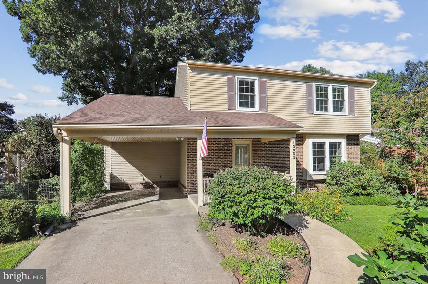 Amazing opportunity to own this hidden gem in South Four Corners.  Beautiful 4 bedroom (all on upper level) 2.5 bath single family home, conveniently located off University Blvd in Silver Spring.  Home boasts an open concept floor plan with generously sized rooms and high ceilings.  Kitchen has been beautifully updated to include white cabinetry, quartz countertops and stainless appliances as well as offering table space near family room. Expansive deck located off of family room overlooks large and private rear yard featuring mature plantings and large shed for storage.  Main level features hardwood floors throughout and includes light and bright living room, spacious dining room and family room which also features wood-burning fireplace and vaulted ceilings with skylights.  Upper level includes 4 spacious bedrooms (all are good sized) and 2 full baths including ensuite bath in primary bedroom.  Both bathrooms have been tastefully updated.  Lower level offers an abundance of space including recreation room, office/guest room with walk-in closet, utility/work/storage room, and 2nd powder room.  So many recent improvements including: 2022 - Roof, leaf guards on gutters, new chimney and fireplace;  2021 - Renovated 2nd floor hall bath, basement powder room;  2019 - Replaced 9 thermal pane windows & 1 sliding glass patio door, renovated kitchen with new KitchenAid appliances;  2018 - Front porch railings and columns replaced.  Don't let this one pass by as its 1980s construction is not common for the neighborhood and is conveniently located near Woodmoor shopping plaza, Burnt Mills Shopping Center featuring Trader Joes and blocks to Sligo Creek Park and several houses of worship.  Location makes it easy to jump on  all commuter routes including I-495, University Blvd or Rte 29.