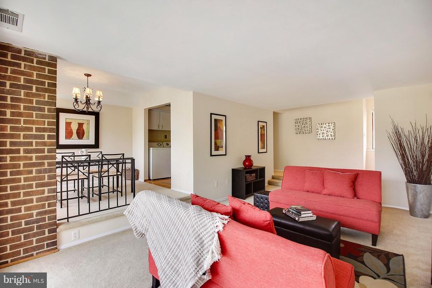 Bright spacious condo offering 1000+SF of living space. Open living room/dining room with oversized windows & sliding glass door to the balcony. Two large bedrooms both with ample closet space. Washer/dryer in unit. Community amenities include permit parking, landscaping, pool, tennis courts & playground. Quiet 15-acre community adjacent to Forest Glen Metro, easy 5-min walk for commuters!