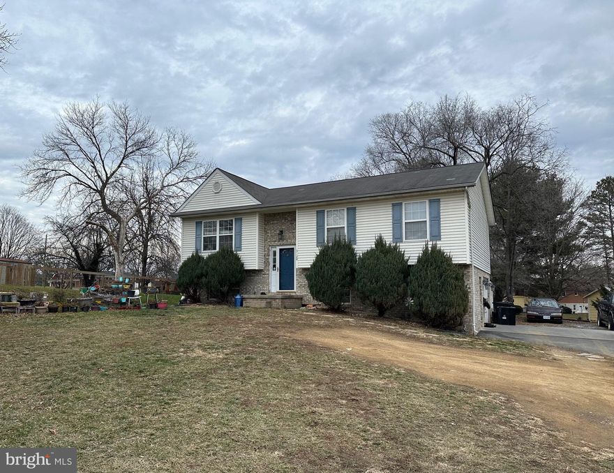 This spacious split-level home, nestled in the Winchester's city limits, offers both convenience and room to grow. With three bedrooms, two bathrooms, and a host of desirable features, this property is a canvas waiting for your personal touch. The main level boasts a well-designed floor plan, featuring a functional kitchen, inviting living space, and access to the deck and fenced-in yard—a perfect oasis for outdoor gatherings and play. The finished basement adds an extra dimension to this home, presenting a versatile space that could be transformed into a family room, recreation area, or a home office to suit your lifestyle.
While the home does need some cosmetic work, this presents a fantastic opportunity for you to add your personal style and creative flair. Property is being sold As-Is and seller cannot make repairs.