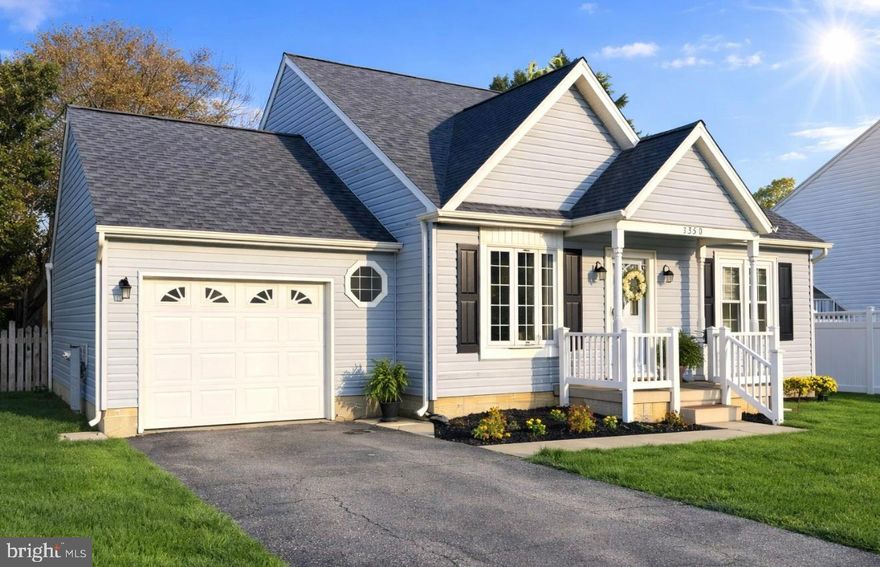 Welcome to this beautifully maintained and rarely available Cape Cod located in the desirable Sunnyfield Estates neighborhood. Offering approximately 1,300 finished square feet, this move-in ready home features 3 bedrooms, 2 full bathrooms, a walk-out basement, and an oversized one-car garage.
Step outside to enjoy the spacious backyard, complete with a two level large deck, fully fenced yard, storage shed, and added privacy as it backs to peaceful wooded views—perfect for relaxing or entertaining. 

The exterior has been thoughtfully updated with fresh landscaping, power washing, newly painted shutters, a new full-glass storm door, and frost-free outdoor spigots for year-round convenience.
Inside, the main level boasts a stunning vaulted ceiling in the living room, creating an open and airy feel. The kitchen flows seamlessly into the dining area, ideal for everyday living and gatherings, and features a new stainless steel refrigerator with an ice maker. The main-level primary suite includes its own vaulted ceiling, walk-in closet, and private en-suite bath.  Upstairs, you’ll find two generously sized bedrooms with brand-new carpeting and an additional full bathroom. Closets throughout the home have been freshly painted and upgraded with organizers for improved storage and functionality.

Additional highlights include newer double-hung windows, brand-new plantation blinds, a new GE washer, newly installed smoke detectors and carbon monoxide detectors, and a 2008 architectural shingle roof with a 30 year warranty. The home also includes an alarm system and a stereo surround sound system in the living room.  The unfinished basement offers excellent potential, featuring walk-out access, a dedicated workshop area, and rough-in plumbing ready for a future full bathroom.

Conveniently located within the Anne Arundel County school system, this home provides easy access to shopping, dining, major highways, and is ideally situated between Baltimore, Washington, D.C., and Annapolis.