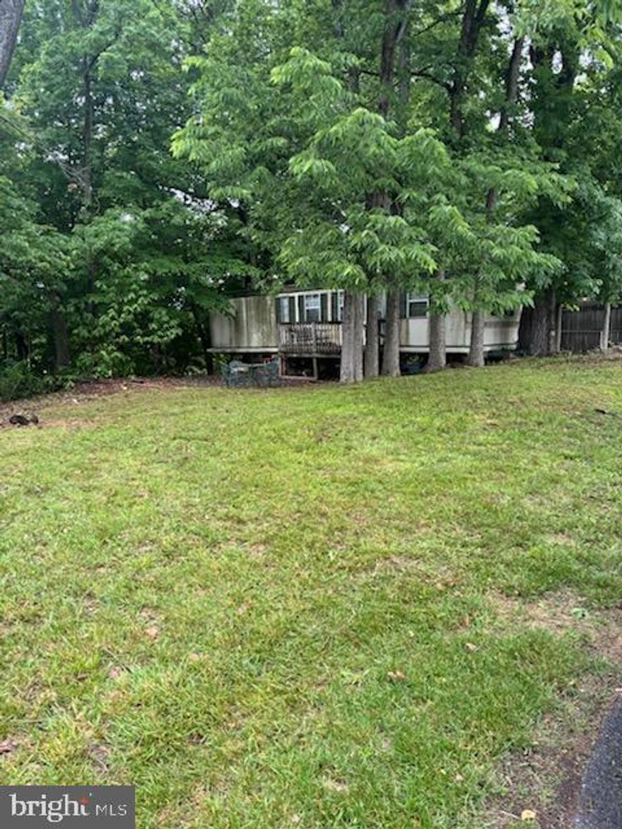 Lot is being Sold "AS IS" Camper has not been lived in for several years. Need to sign a hold harmless just to be safe. Camper needs work done.   Lots of potential, backs to trees.  Property is within walking distance to the common grounds, pond, pool, camp store.  Property is located across from the open common grounds where most events are held.  Great lot to make your own.  Block 78 Lot 66 is also for sale.  You can have two lots right next to one another.  


This is a gated community so you need to enter at the guard shack. Entry is not permitted without ID per the office rules. Bring ID's to the office or guard shack for visitor pass. THIS IS A SEASONAL CAMPGROUND! OPEN FROM APRIL 1 TO NOVEMBER 1. ** WELCOME TO RIVER BEND/SEASONAL LOT AVAILABLE TURN KEY** River Bend is a privately owned 400 acre recreational- vehicle camp resort with seasonal activities for members, families and guests. This great RV park is tucked away on the Upper Potomac River of West Virginia, River Bend is one of West Virginia's most popular family seasonal destinations. . Just a short drive from the Washington and Baltimore metro area. Open with utilities from April 1 to November 1. Lot owners have access to their property the entire year. *** Members Enjoy *** * Amazing views and wildlife, Potomac River access, Trails, Swimming pools, Mini-Golf, Youth center, Tennis and basketball courts, laundry facilities, convenience store, deli and lounge. *Bath houses through out the park, boat ramp, bar and grill and even a church located on the grounds. River Bend also hosts numerous activities such as 4th of July fire works, small carnival, bonfires, poker runs, horse shoe tournaments, car show, Halloween Trick or Treat and so much more.