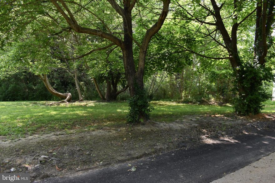 Building lot off Beckwith near the Charles Town public services building and police station.  S. Beckwith is a quiet street with just a couple houses.  This .27 Acre lot is primed for a single family home or duplex.  Currently treed and needs some clearing, but there are a couple super nice trees on the lot to remain.  Easy access to all commuter routes of 9 and 340.