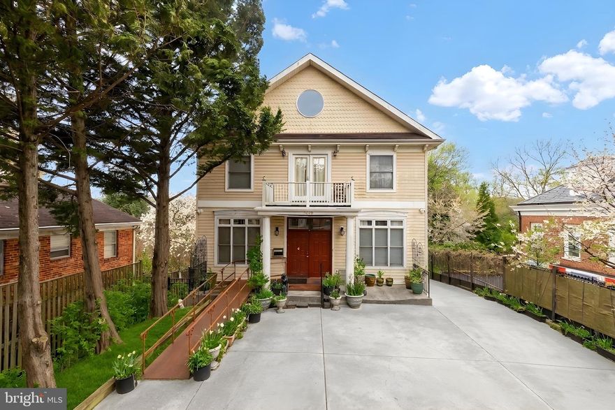 Set prominently along MacArthur Boulevard, this expansive residence offers over 5,000 square feet of interior living space across three finished levels, presenting a rare opportunity for customization, renovation, or investment in a sought-after NW Washington, DC location.

The main level offers generous scale and a flexible layout, featuring multiple living areas including a formal living room, additional sitting room, and a spacious family room with fireplace. The kitchen is centrally positioned with access to adjacent dining and living spaces, creating a strong foundation for reimagining the flow and design. A main-level bedroom and full bath add versatility for future use. This level is ready for updates, offering the chance to tailor the space to your vision.

Upstairs, the home opens to a well-maintained upper level in good condition, featuring a large primary suite with walk-in closet, ensuite bath, and private balcony. A dramatic, oversized studio space provides exceptional flexibility for a home office, creative workspace, or additional bedroom, while a separate library adds further dimension to the layout.

The lower level expands the footprint with a large recreation room, additional bedroom, full bath, and storage. Similar to the main level, this space presents an opportunity for renovation and customization to maximize value and functionality.

With its substantial size, flexible layout, and prime location, this property offers an exceptional opportunity to create a dream home or capitalize on its potential as an investment property.