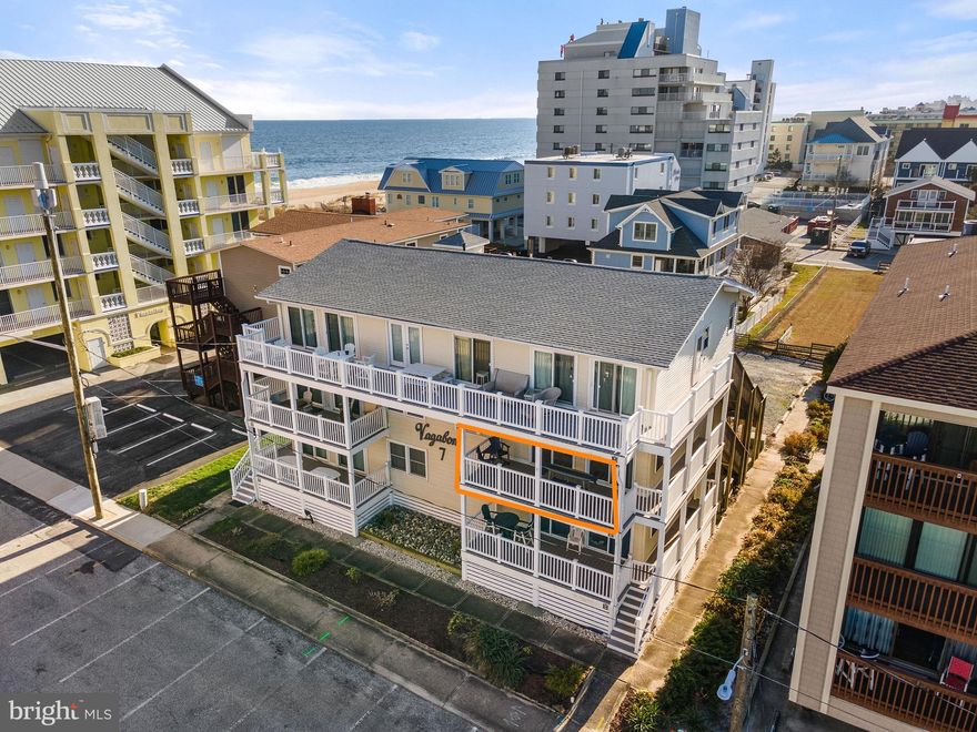 One look and you will fall in love with this stunning three-bedroom two-bath beach home. Recently updated, it features a bright open floor plan, and the kitchen is outfitted with stainless steel appliances and granite countertops. Step outside and enjoy the ocean view on the large balcony, which is great for outdoor entertaining.  You will have 2 assigned parking spots in the private parking lot. Have you always wanted a turnkey beach home? Take the first step to making your dreams come true.