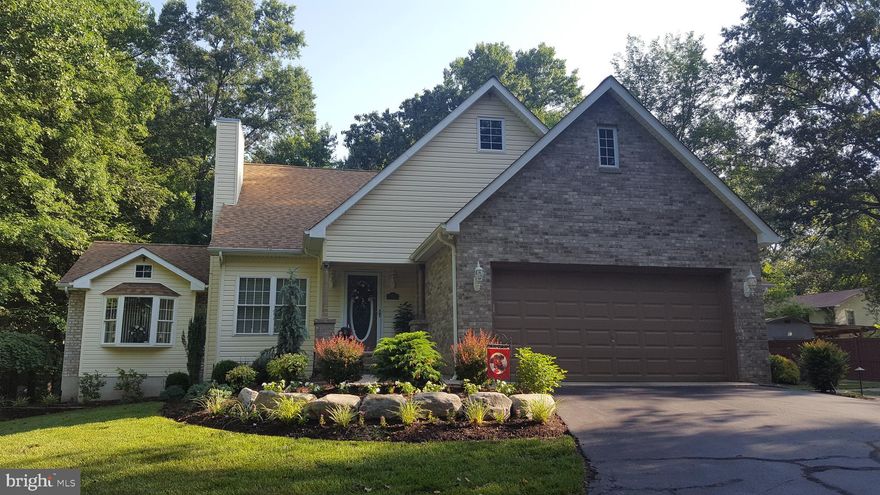 Home Sweet Home! This custom built home comes with lots of privacy and gorgeous backyard retreat. Original owners have modernized this home featuring 20x30 kitchen/sunroom addition, paver walkways/patio, 18x20 hot tub room addition. Gas furnace and hot water heater upgraded in 2015. New roof and washer/dryer in 2019. New kitchen counter tops and Samsung refrigerator.Relax outdoors and enjoy those summer BBQ's, large back yard features fenced in yard, paver patio, lighted pergola and 10x12 amish vinyl shed. 2 car garage is finished with epoxy stronghold floors with plenty of storage cabinetry. 1 year home warranty for buyer!