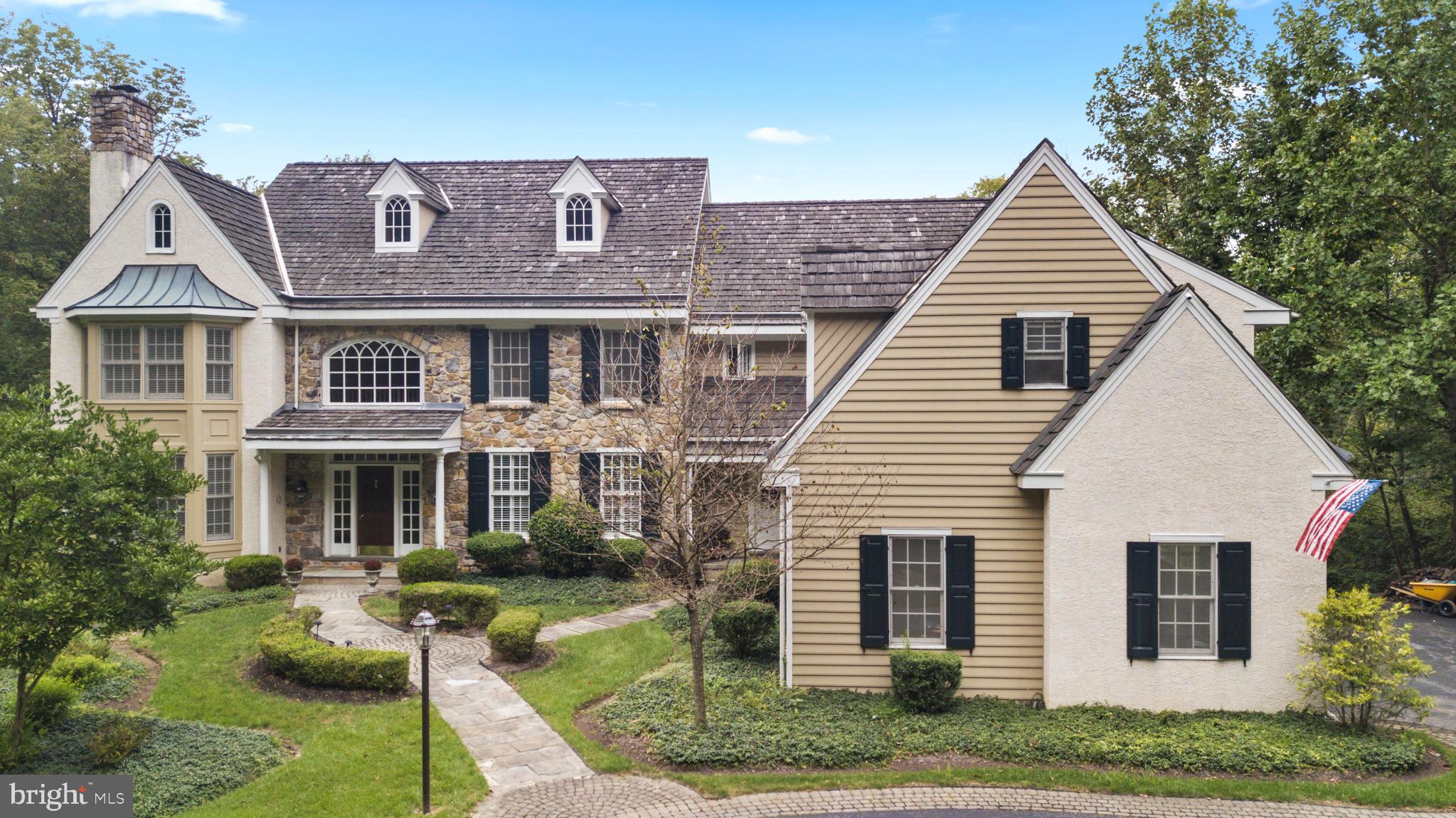Welcome to 132 Jaffrey Road, Malvern. This one of a kind spacious, custom-built home located in prestigious Radnor Hunt s horse country on the Main Line has it all: privacy, tranquil views, and a resort-like appeal. The first floor features an open two-story entrance hall flanked by a formal living room with gas fireplace and a spacious formal dining room. The gourmet chef s kitchen features granite counter tops, island, wet bar, built-in desk and tons of cabinet space including a walk-in pantry. Through pocket doors you enter the fabulous sunroom with a gas fireplace, tiled flooring and large windows which allow an abundance of natural light. The step-down great room boasts a vaulted ceiling, stone hearth fireplace and built-ins. A spacious cherry wood office with built-ins, two powder rooms, a mud room, and laundry room with granite countertop & cabinet storage and spacious 3-car garage with custom shelving completes the first floor. The second floor offers a master bedroom suite with a marble bathroom with vintage bathtub and walk-in rainfall shower, his/her walk-in closets. Other BRs include a princess suite with full bath and two additional bedrooms that share a Jack & Jill bathroom. Back stairs lead to a large guest suite with cedar closet. All bedrooms have closet organizers, built-in shelves, and desks. The lower level features a daylight/walk out in-law suite with 6th bedroom, full bath, great room with fireplace, kitchenette, large bar area with dishwasher, refrigerator and cabinet storage. Additional room for game room, exercise room, or living area. This level includes a double set of French doors that walk out to the extended patio and pool area. The outdoor living space consists of multi-level decks overlooking the pool with stone surround spa and waterfall. Upgrades include new pool deck, post and rails on upper deck, whole house generator, security camera system, hot water boiler, new well pump, split rail fence/gates and complete pool re-plaster including tile and coping. Private living on 2.1 acres with level fenced yard, tranquil views of neighbor s pond and open space. This property is located in the award-winning Great Valley School District and is minutes away from Malvern Borough, Malvern train station, upscale dining and shopping. Owner is a licensed PA real estate agent.