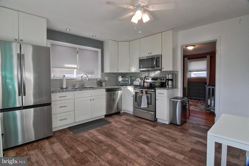 Photo of 203 Lemon Street, POTTSTOWN, PA 19464 (MLS # PAMC2169872)