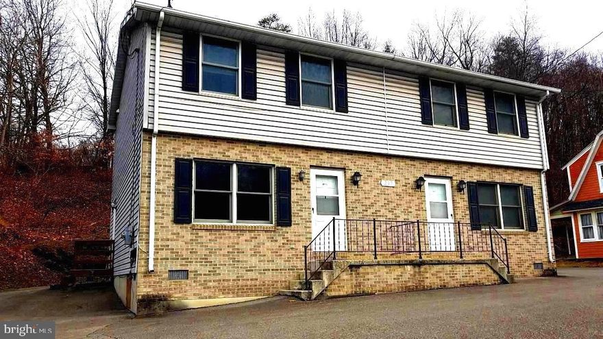 No yard to maintain, owner plows when snows.    1/2 mile from Town of Bath in Berkeley Springs.
3BR and full bath on 2nd floor and LR, Kitchen, 1/2 bath and laundry area on 1st floor.
Kitchen appliances, 1st floor has all brand new commercial plank flooring for easy cleaning.
Owner says NO PETS, and NO SMOKING inside or outside on this property. Comfortable home to live in.