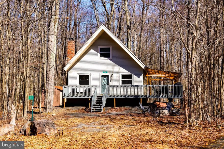 Tucked away at the end of a quiet cul-de-sac, this charming 3-bed, 1.5-bath chalet is the perfect mountain getaway. Inside, you'll find a cozy living room with a fireplace, a lovely dining area, and plenty of deck space for cookouts or just soaking in the fresh mountain air. Plus, you'll have access to an amenity-filled community that allows short-term rentals—great for personal use or investment! Schedule a showing today! Ask how to receive a $2,000 lender credit towards closing costs or lowering your interest rate!
