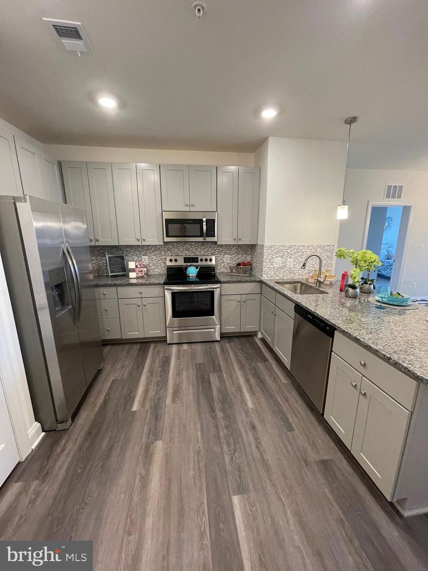 QUICK MOVE IN - The Abigail offers 2 spacious bedrooms, each with a walk-in closet and 2 full baths. and comes with a private garage. The kitchen comes with all appliances and opens to a spacious living/dining room area that has access to your private balcony.  A spacious laundry room and pantry allow for plenty of storage.  Upgraded flooring throughout,  upgraded kitchen cabinets and countertops,  ceiling fans.   Sales Center has moved  is located  at 403-302 Bold Ruler Ct and  is open  Friday - Tuesday 11-5  New Decorated Models are OPEN
 SETTLE ON/BEFORE 4/28/23 AND RECEIVE ADDITIONAL INCENTIVES.