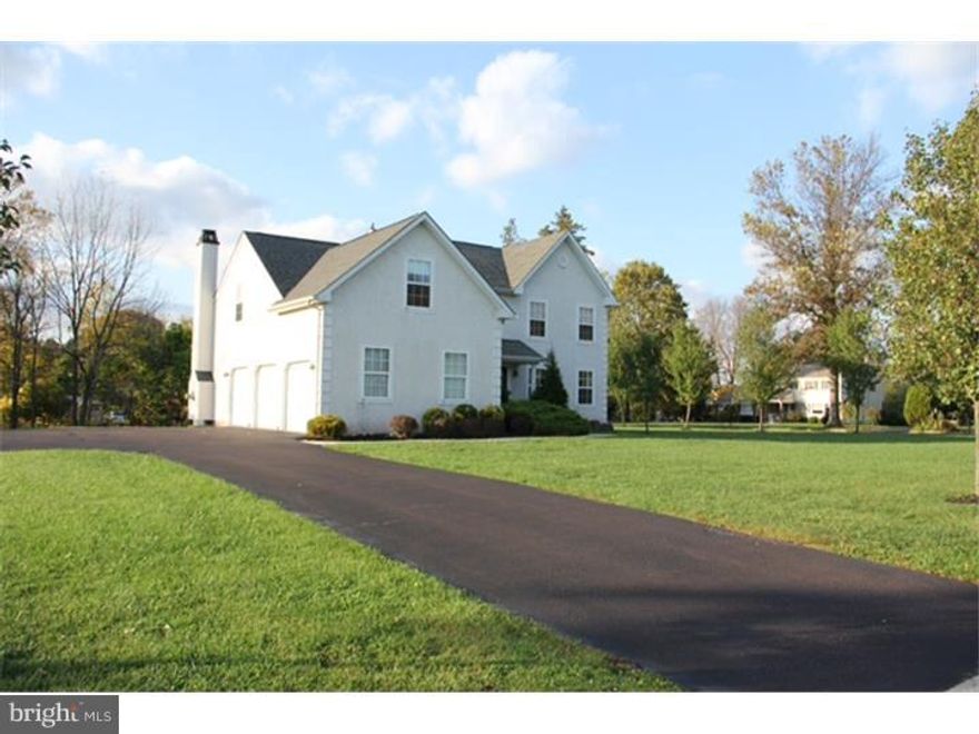 Exceptional colonial home situated on 3/4 of an acre just 1 mile from Skippack Village. This property boasts 4 spacious bedrooms, 2 1/2 baths, large attached wooden deck on rear of house, spacious 3-car garage and finished basement. Open kitchen with maple cabinets and tiled floors opens into great room with vaulted ceiling and gas fireplace. Crown molding throughout first floor. Master has large bathroom with soaking tub, separate shower and double vanity. Upstairs bedrooms include crown molding, wainscoting and custom built-in cabinetry in all bedroom closets. This home has all of the upgrades that buyers seek and has been meticulously cared for. Septic maintained annually, utility invoices are on file available upon request and ducts have been cleaned in last 15 months.  New carpet and painting thru out.