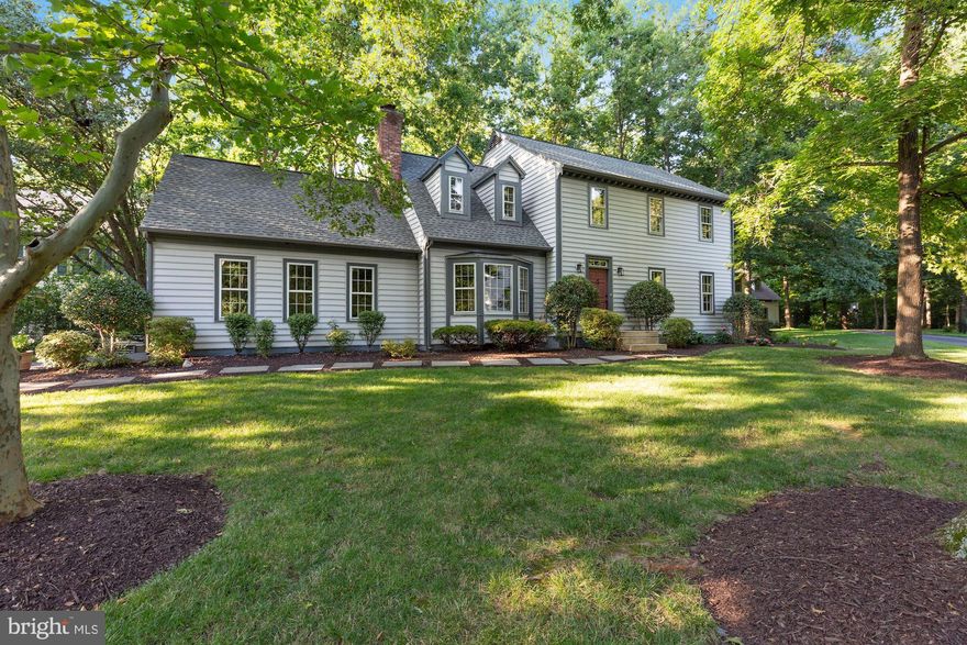 Nestled in the woods with mature trees and landscaping on a spacious .37 acre lot. Long driveway and side entry garage make this private retreat a hidden gem in the Burke community of Spring Lake Woods. Non-HOA community in an enclave of $1M plus homes! Classic colonial custom built home with newly refinished hardwoods on the main level! Gorgeous exposed beams, brick fireplace with wood-burning stove and newly updated kitchen! New carpet on the upper and lower levels, freshly painted bottom to top and new fixtures, fans, faucets hardware and more. 
Versatile yet classic floorplan with spacious rooms and custom touches throughout. This beautiful home boasts bay windows, shadow-boxing  and crown molding throughout the main level. Granite kitchen with newly updated cabinetry and stainless appliances. Eat-in kitchen  with bay window shows off the wooded surrounds and steps down to an enormous, yet cozy, family room leading to the expansive deck.  Wooden ceiling  beams and raised-hearth brick wood stove with mantle make this the perfect place to unwind and spend time with family. 
Upper level primary retreat features cathedral ceiling with exposed beams, dormer windows, walk in closet and fully renovated bathroom with skylight. 3 additional bedrooms are spacious and crisp with new paint, carpet, light fixtures and  door hardware. Large, secondary bathroom is light and fresh with a skylight and newly updated vanity and  fixtures.
Lower level features wainscoting, recessed lighting, walk-in cedar closet, newly renovated full bath and a bonus room. Large laundry area with built in shelving/cabinets and a laundry sink. Windows and siding freshly power washed, grounds have been landscaped,  living space has been painted and updated and ready for new owners to write their next chapter! Just minutes to the renowned Burke Lake Park, VRE and major commuter routes.