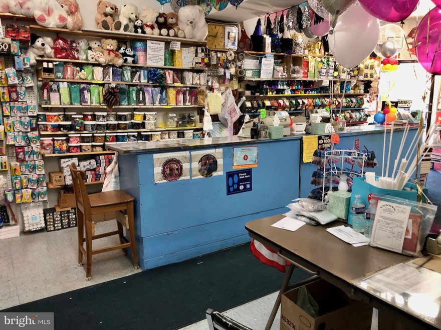 Business Property in the Italian Market vicinity! Three story, double property, zoned CMX2 Commercial. Roughly 5500 square feet. Established retail business but has the potential of many other uses. Ground level has ramps to enter the building. Building features three floors of open span area plus a full basement. Excellent opportunity to have a commercial business in one of South Philadelphia's finest locations.