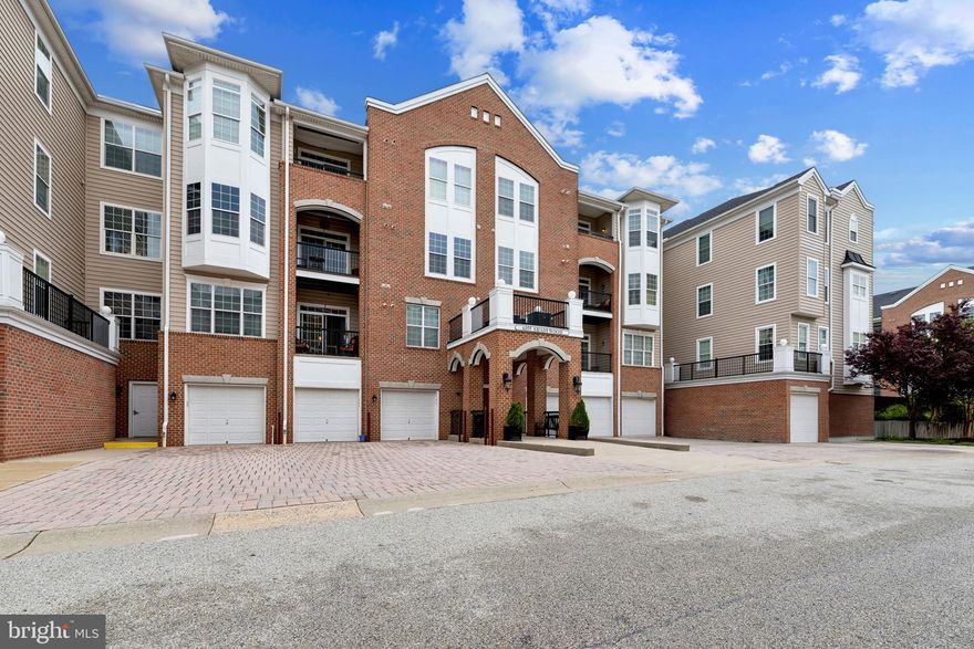 Beautifully updated Colonial-style top-floor condominium offering 2 bedrooms, 2 bathrooms, 1,458 finished square feet, and a 1-car detached garage in the sought-after 55+ community of Gatherings at Lyndwood. // Freshly painted interiors and stylish laminate flooring welcome you into the foyer, where a carpeted formal dining room sits to the right, perfect for hosting. To the left, the thoughtfully updated kitchen features newly updated (April 2026) quartz countertops and stainless steel appliances, a replaced faucet, a pantry, and a breakfast bar that opens seamlessly to the expansive living room with a tray ceiling and access to a covered balcony—ideal for everyday living and entertaining. // The well-designed layout continues with two spacious bedrooms featuring newly installed carpet (April 2026), each offering generous closet space, including a walk-in closet. Two full bathrooms, updated in 2022, add modern appeal, along with a conveniently located laundry room. // The primary suite serves as a private retreat, complete with a beautifully updated en-suite bath featuring a newly updated quartz vanity top (April 2026), as well as a charming columned sitting area with bay windows that fill the space with natural light. // Additional highlights include an HVAC system updated in 2024 and a covered balcony perfect for relaxing outdoors. // Residents of Gatherings at Lyndwood enjoy access to a variety of resort-style amenities, including a community pool, fitness center, pickleball court, and a clubhouse, all ideally situated adjacent to a scenic public golf course for added recreation and picturesque surroundings. *Select photos have been enhanced with virtual staging for illustrative purposes only.