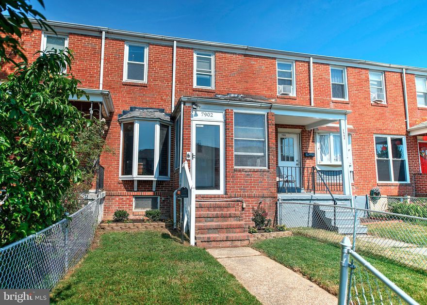 Excellent opportunity to own this well maintained 3 bedroom, 2 bath townhouse with spacious living room with bay window, separate dining room with chandelier and updated kitchen with gas stove, SxS refrigerator and double stainless steel sink.  Off the kitchen is an enclosed patio with access to rear parking pad. Upper level primary bedroom has laminate flooring, full bath with ceramic tile floor and 2 more bedrooms. Ceramic tiled floor lower level has a full bath with stand up shower, laundry, utilities and plenty of room for storage or family room with access to outside. Front has an enclosed front porch with storm door and front yard is fully fenced.  Attic space for additional storage has pull down stairs. 3 year old roof with architectural shingles.