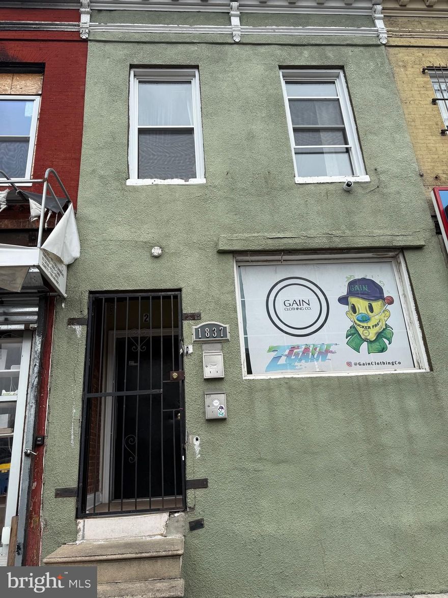 1st floor commercial 2nd floor can have residential rental can live in. Two separate meters and central air unit. Fenced yard .  Can have a parking space..  basement partially finished.  1.5 bath. 1st floor possible rent $1000 2nd floor $1000 parking $100 basement $200