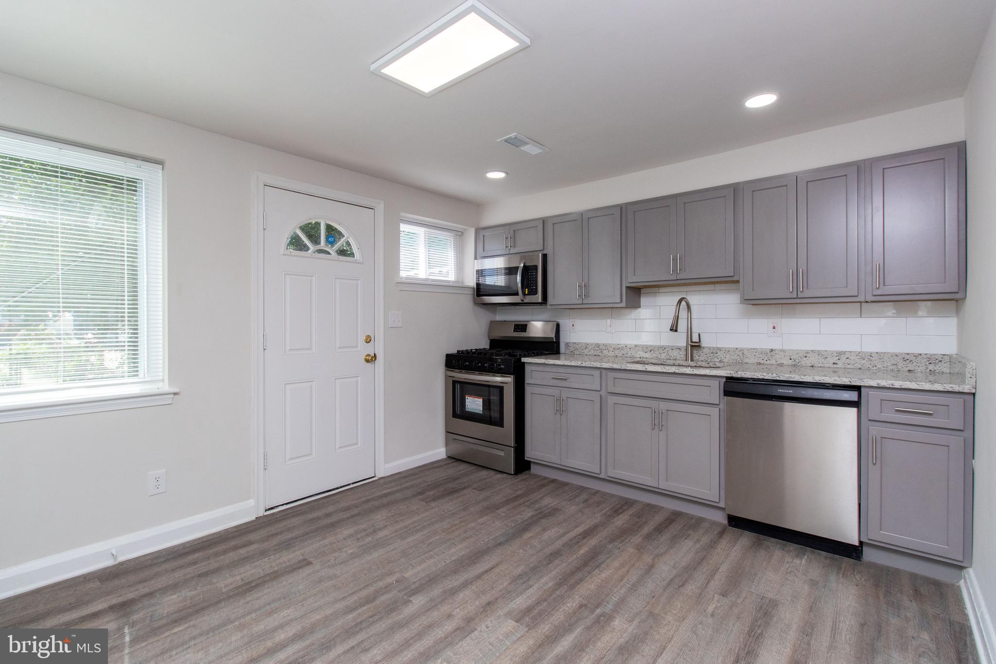 Available Immediately! Vouchers welcome!
Change of Management – If You Applied Previously, Please Let Us Know
Welcome to 4539 Shamrock Ave, a beautifully renovated 3 bedroom, 1.5 bath rowhome in Baltimore. If you applied previously, please reach out—we’d love to reconnect under the new management. VOUCHERS WELCOME!
Step inside to a spacious main-level living room and bedroom, all with brand new LVP flooring and fresh, neutral paint. Head downstairs to the updated kitchen featuring granite countertops, stainless steel appliances, and access to the fenced backyard—perfect for entertaining or relaxing. A convenient half bath and laundry/storage area with washer and dryer are also on the lower level.
Upstairs, you’ll find two more bedrooms and a full bathroom.