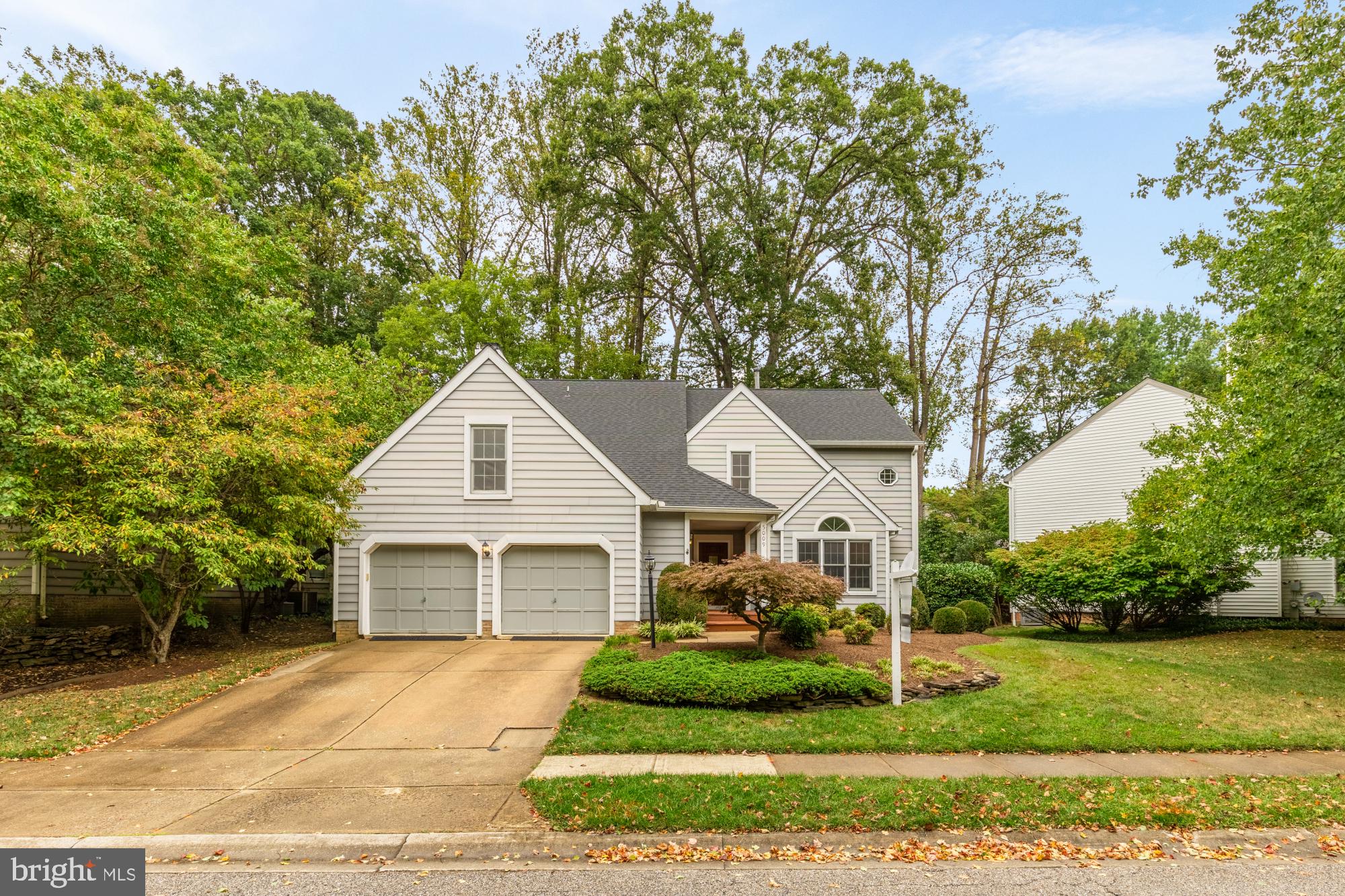 Welcome to 5009 Straight Star Place, a charming colonial tucked away on a quiet, tree-lined cul-de-sac in Columbia, Maryland. Beautifully updated and sunlit by floor-to-ceiling windows, this 5 bed, 3.5 bath home feels spacious and comfortable for every day living and hosting alike.
Enter to a 2 story foyer with a waterfall staircase that leads to the bedroom level, where you'll find a true retreat in the expansive owner's suite, which is complete with vaulted ceilings, sitting area, walk-in closet, and en suite with soaker tub. Down the hall, a hall bath and three other bedrooms await, offering exceptional space and flexibility for your needs, whether that be a home office, guest room, or some combination of the two. This floor has recently been updated with brand new carpet, providing an inviting, soft landing at the end of each day.
On the main level, find beautiful, blonde hardwoods, tasteful design, and a functional, open concept living space. In one direction, a living room flows into a dining room with abundant natural light and an ideal nook for nurturing indoor plants; in the other and down the hall, a bright, updated eat-in kitchen leads into another large living room space, with access to the large backyard and deck. You'll also find a half bath and roomy laundry room on this level, as well as inside access to the 2 car garage.
Experience even more versatility down the stairs to the basement, where you'll find another bedroom and full bath, as well as a wrap-around bonus recreation space, perfect for a home theater, gym, or game room—whatever fits your lifestyle.