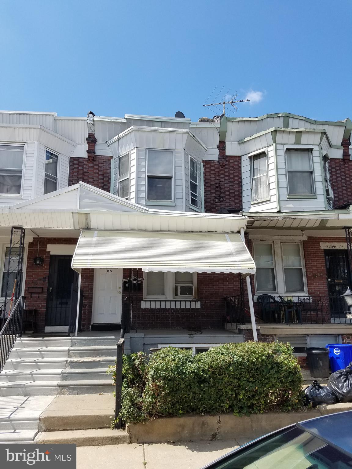 Welcome to this charming and well-maintained duplex, offering a fantastic opportunity for investors seeking immediate rental income located in Carroll Park. Both units feature their own gas hot water heater, along with their own heating and air systems -- Unit 1 features electric baseboard heating and a window A/C unit and Unit 2 features both central heat and air. The first-level one-bedroom, one-bathroom unit is currently vacant and offers a comfortable layout. A cozy living room includes a large window and built-in shelving. It flows seamlessly into the kitchen with ample cabinet space. The spacious bedroom is located at the rear of the home and features a large window that fills the room with natural light. A full bathroom is conveniently located off the hallway. Upstairs, the occupied second-level is a two-bedroom, one-bathroom unit. The kitchen features tile flooring, a tile backsplash and a new refrigerator. The primary bedroom located in the front of the home boasts a stunning bay window allowing ample natural light. A second bedroom is located at the rear of the unit, offering additional privacy. The full hall bathroom features a tub/shower combo and a skylight making it bright and airy. Located in a convenient location close to public transportation and I-76. This property is a great blend of classic style and reliable rental income—don’t miss out on this solid investment in Carroll Park!