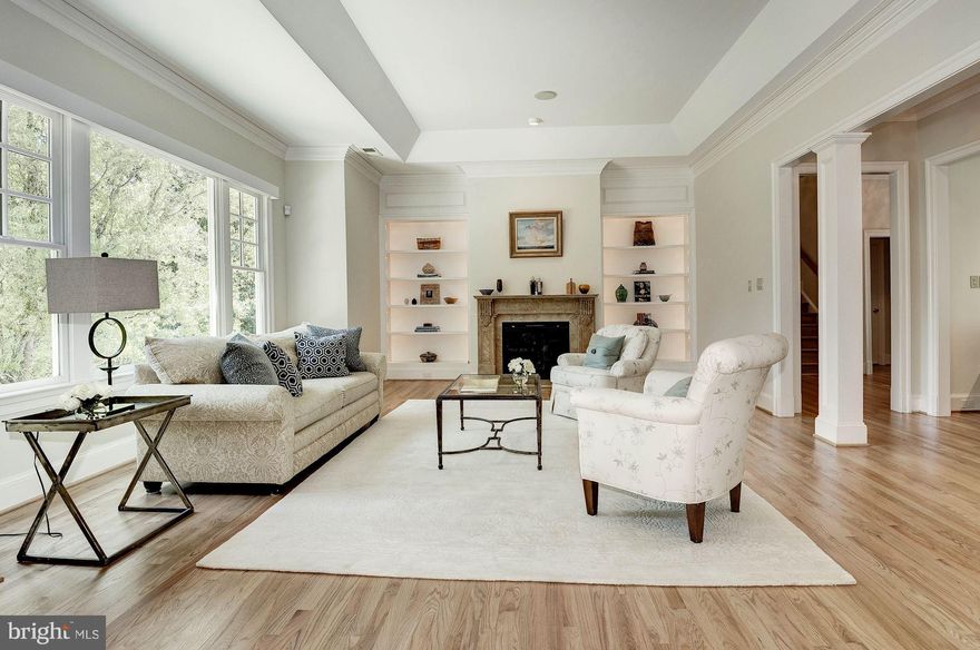 Fabulous home completely remodeled from top to bottom with high end finishes & designer appointments * Elegant yet comfortable * Open floor plan with 10 ft. ceilings and generous sized light filled rooms * Entertainers delight with gourmet kitchen & family room & private backyard with expansive patio area around pool * Lushly landscaped acre with fenced backyard * Minutes to Tysons, Metro & I-66