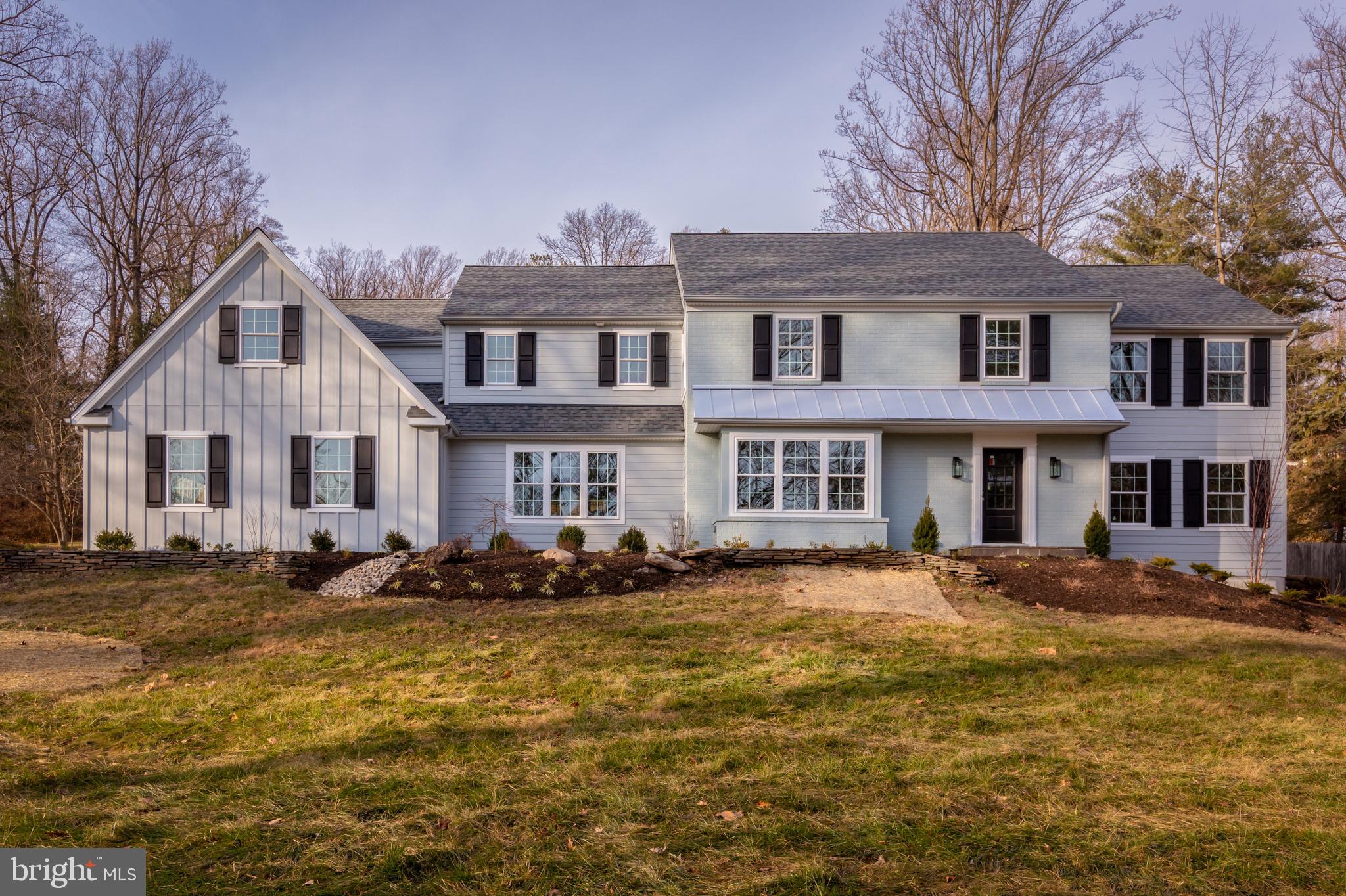 A gorgeous, bright and sunny 2 story colonial TOTALLY RENOVATED by SPOSATO HOME BUILDERS. This beautiful home is located on one of the prettiest and most sought after streets in Wayne and it has all the bells and whistles that Sposato Homes adds. It has been transformed into a spectacular, newly constructed home that features an open floor plan and attention to every detail. The first floor features a spacious Living Room with wainscoting. The large Gourmet Kitchen features custom white cabinets, quartz counter tops, stainless steel appliances that include a 6 burner gas cook top, double ovens that you can control through WIFI, microwave, a farm sink, built-in refrigerator plus an island with room for stools and storage. The Kitchen is open to a Breakfast Room and a Family Room with a gas Fireplace, Wet Bar and outside access to a patio and yard along with an Office. In addition there is a Powder Room, Mud Room with cubbies and entrance to a 2 car Garage. A stunning Dining Room with wainscoting is located next to the kitchen. There is abundant recessed lighting plus beautiful hardwood floors on this level. The second floor features a Master Bedroom,Suite with a seating area, A Huge walk-in custom closet plus an additional closet and a Luxurious Master Bathroom. There are 4 additional Bedrooms on this floor, all have en suite Baths. All bedrooms have ample closets. There's also a Laundry room on this level.. To top it off the basement is finished with a Playroom, additional half Bathroom plus a ton of storage. This finely crafted home leaves nothing to be desired. Conveniently located near parks, libraries, restaurants and shopping plus an easy commute to Center City and the award winning Radnor schools!