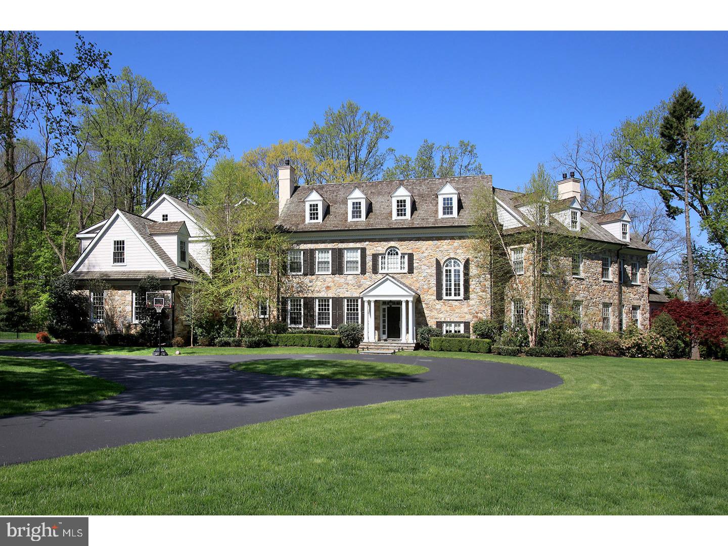 Move right into this incredible Devon Estate, which offers the rarest combination of superior newer construction using old world designs, millwork, materials and finishes with every amenity. Majestically set on a private flat 2+ acre lot. This premier residence is beautifully enhanced by stunning landscape designs featuring specimen plants and trees, flagstone terraces, and a historic multi-functional barn. Features included impeccable energy efficient construction, superior HVAC, electrical and sound systems, stunning walnut floors, spectacular moldings, soaring 10' ceilings on the first floor, 9' ceilings on the second floor, breathtaking Gourmet Kitchen opening up to Breakfast Room and dramatic Family Room, gracious Living and Dining rooms, a rich Cherry paneled Library with extensive built-ins and coffered ceiling, sumptuous Master Suite with His and Hers Baths, and 5 additional Bedroom Suites with expansive In-Law/Au-Pair Suite. Additional 2,000+ sq. ft. historic barn on the property that has the option of conversion into a carriage house and/or pool house. Interior furnishings also available.