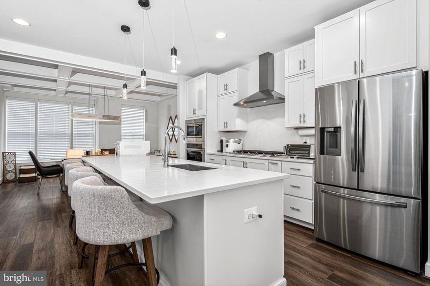 Welcome to this stunning luxury home in The Retreat at Westfields, an exceptional showcase of Miller & Smith’s award-winning design. this property is loaded with premium designer upgrades and high-end finishes Sited on a prime lot as part of the community’s grand finale, this home offers additional privacy and backs directly to serene, wooded parkland—providing a peaceful, natural backdrop that is a rare luxury in Chantilly.
The heart of the home is the signature Miller & Smith kitchen, an open-concept marvel featuring an oversized quartz island, upgraded cabinetry, and a sleek ceramic backsplash. The chef-inspired space flows seamlessly into a magnificent great room, where a sophisticated Coffered Ceiling adds architectural depth and an extra touch of elegance. This light-filled living area is perfect for both grand entertaining and cozy evenings. The main and upper level is finished with luxury vinyl plank flooring, recessed lighting, and a striking light fixture in the dining area.
Step outside to your unique outdoor oasis featuring a specialized "1/2 porch and 1/2 deck" configuration. The premium Trex decking in Woodland Brown and the American Railing System offer a sophisticated space to entertain while overlooking the tranquil forest. The backyard is further enhanced by a newly installed fence and a concrete patio, ensuring both security and seclusion.
Upstairs, the primary suite serves as a tranquil retreat with ceilings, a custom walk-in closet, and a spa-inspired bath with a frameless glass shower and dual quartz vanities. Every detail reflects model-level excellence, from the light switches and upgraded ceramic tiles in all bathrooms. Even the garage is upgraded with a LiftMaster ultra-quiet belt drive opener featuring MyQ connectivity..
Ideally located for commuters with easy access to Route 50, I-66, and the Dulles Toll Road, you are also just minutes away from premier shopping and dining at Chantilly Crossing and Fair Lakes. This is a rare opportunity to own a smart, beautiful, and completely move-in-ready home that combines luxury, comfort, and convenience. Schedule your private tour today!